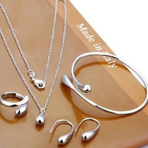 NWT 925 Silver Plated Jewelry Set. Bracelet, necklace, earrings and ring